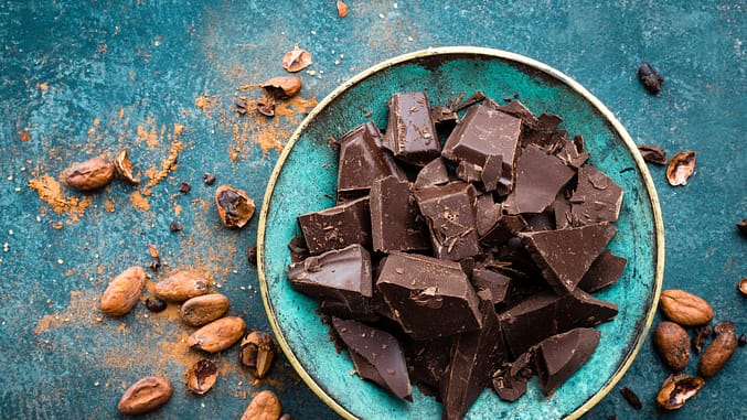 How to Get Into Ketosis Faster? [8 Fast Keto Adaptation Tips] - Try having some dark chocolate.