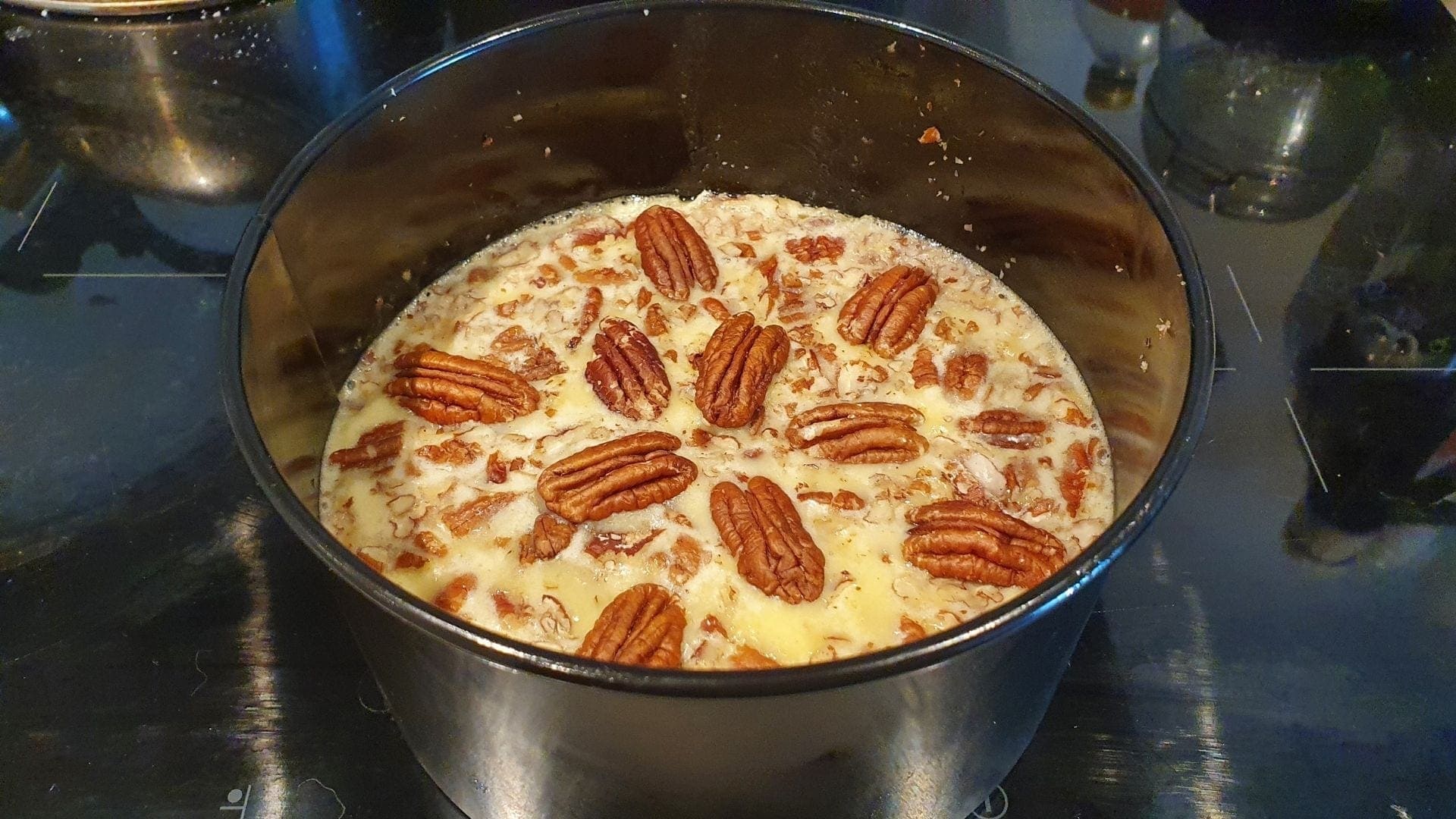 Adding chopped pecans and pecan topping